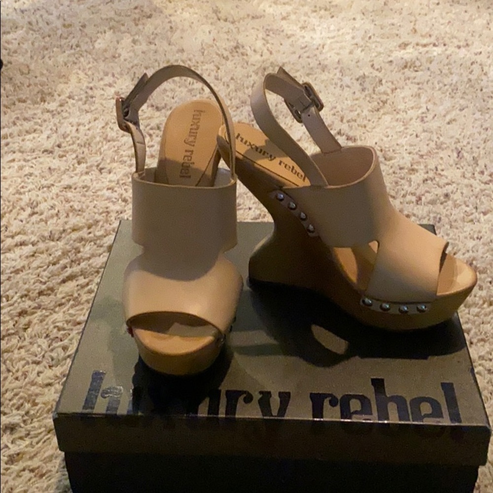 Like new Luxury Rebel wedge sandals